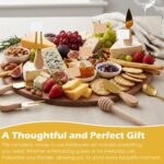A complete 73-piece Afgaogw gold charcuterie utensil set with various cheese knives, tongs, spoons, forks, and dipping bowls.