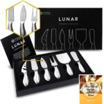 A complete 6-piece ICOSA Living Lunar stainless steel cheese knife set arranged on a wooden board with various cheeses.