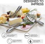 A complete 6-piece ICOSA Living Lunar stainless steel cheese knife set arranged on a wooden board with various cheeses.