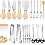 A complete 23-piece LifeMusican charcuterie board accessory set with wooden handles, including various cheese knives, spreade