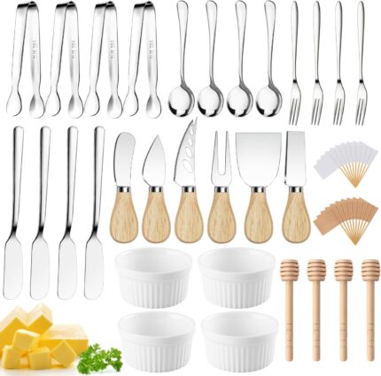 A complete Mlurcu 70-piece charcuterie utensil set with cheese knives, spreaders, tongs, forks, spoons, dipping bowls, honey