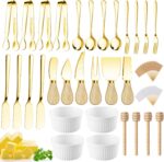 A full Mlurcu gold charcuterie utensil set, featuring various cheese knives, mini tongs, spoons, forks, and ceramic dipping b