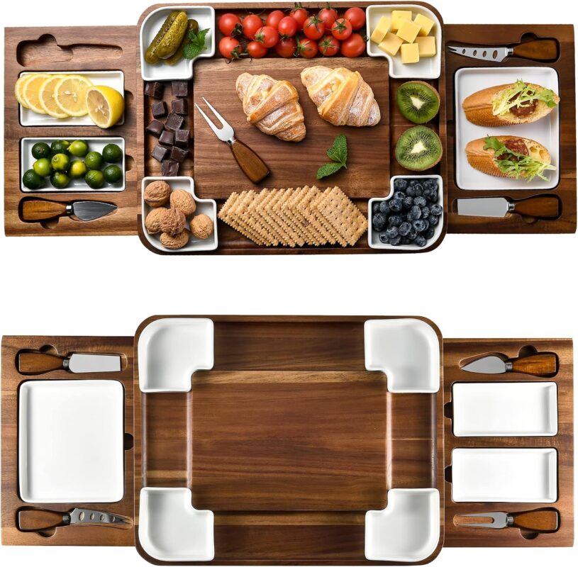 Square acacia wood charcuterie board with ceramic dishes and stainless steel cheese knives, ready for serving.