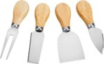 A set of four silver stainless steel cheese knives with wooden handles, arranged on a charcuterie board.
